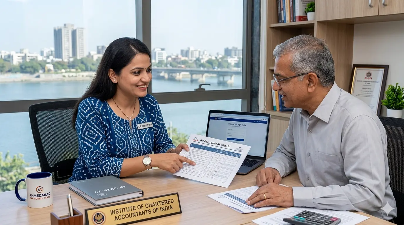 Expert Income Tax Consultants in Ahmedabad discussing New Tax Regime vs Old Tax Regime 2026 with a client.